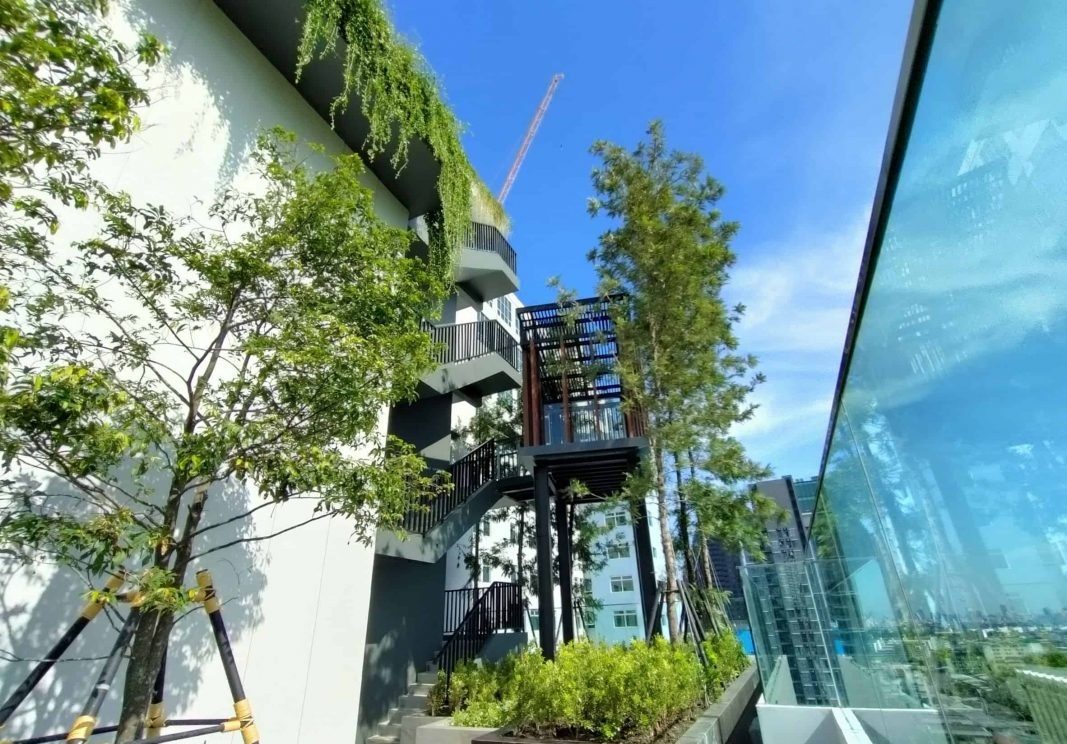 Park Origin Phayathai — sky garden terrace with trees and a city view